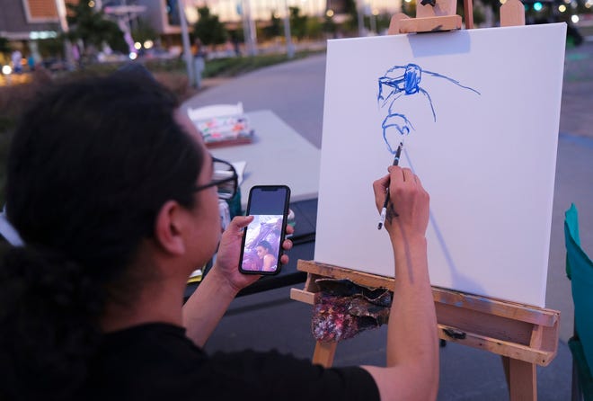 Local artist Daniel Acuna paints live at the September 2021 Color of Art event at Scissortail Park. Acuna is one of the founders and organizers of Color of Art, a free, family-friendly series of events that combine local music, dance and visual art in an immersive community experience. The 2022 series starts May 22 at Scissortail Park.